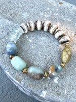 Amazonite, Bone, Glass, and Bronze