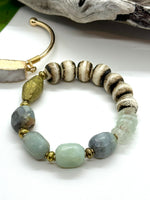 Amazonite, Bone, Glass, and Bronze