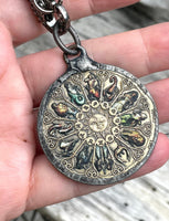 Zodiac Coin on Leather